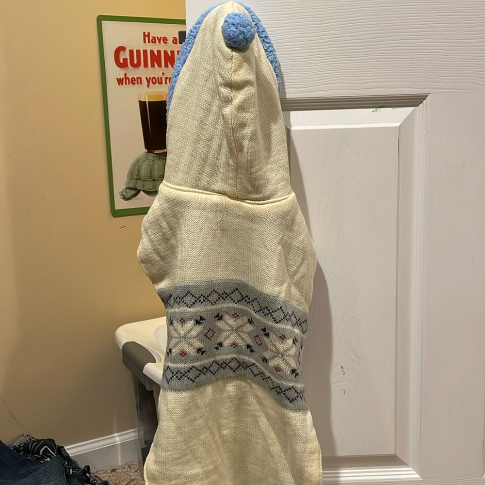 Dog knit sweater/coat with hood.